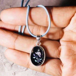 Australian opal in black onyx 925 pendant