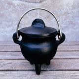 Black cast iron cauldron