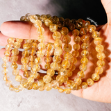 Gold rutile quartz stretch bracelet
