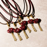 Cinnabar butterfly charm necklace