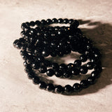 Faceted black onyx 8mm stretch bracelet