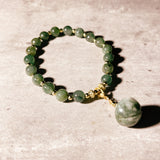 Jade bell charm 6mm stretch bracelet