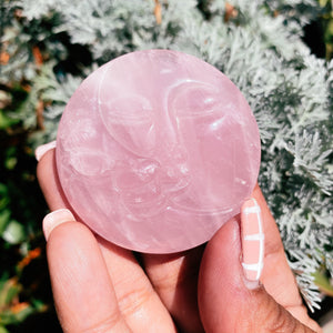 Rose quartz sun moon carving