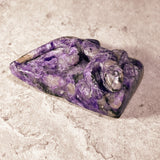 Charoite lizard carving