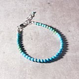 Faceted turquoise waterfall round 925 bracelet