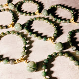 Jade bell charm 6mm stretch bracelet